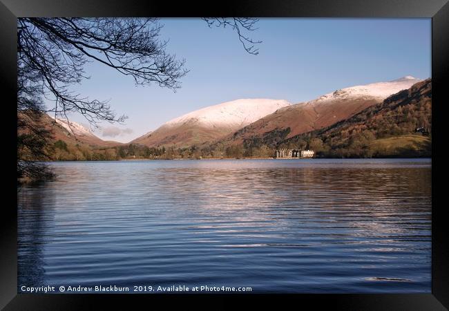 Grasmere with snow capped fells in the background. Framed Print by Andy Blackburn