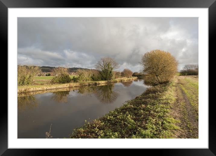 Canal in the low winter sun Framed Mounted Print by Mark Fieldsend