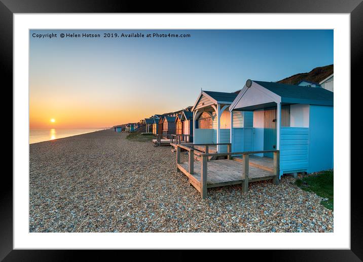 Sunset over Beach Huts Framed Mounted Print by Helen Hotson