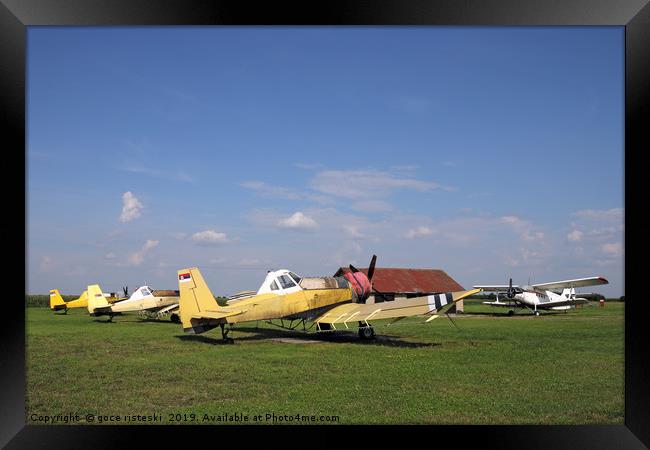 old crop duster airplanes on airfield Framed Print by goce risteski