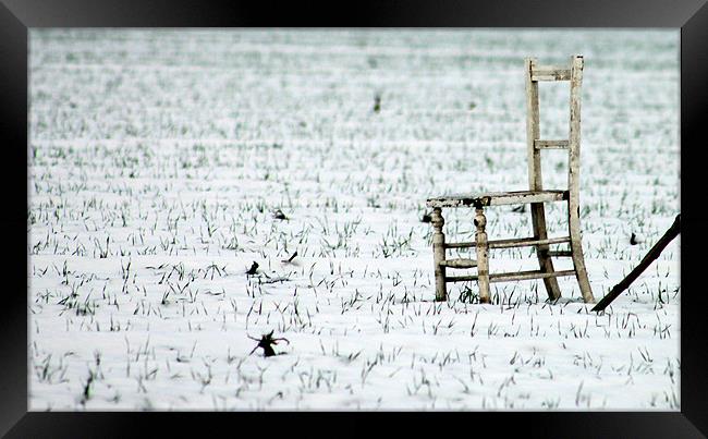 Snow chair Framed Print by John Black