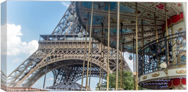 The Eiffel Tower Carousel Canvas Print by Antony Atkinson