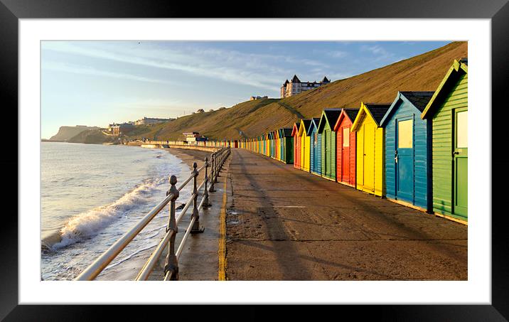 Whitby beach huts Framed Mounted Print by Kevin Elias