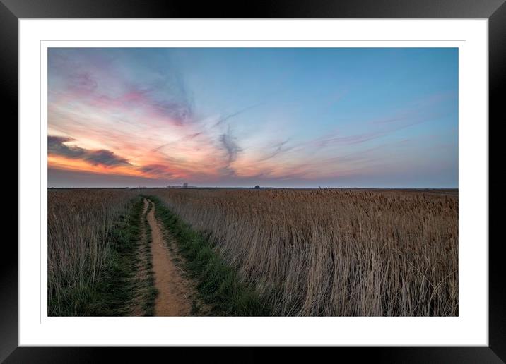 Lingering colours of sunset at Thornham Framed Mounted Print by Gary Pearson