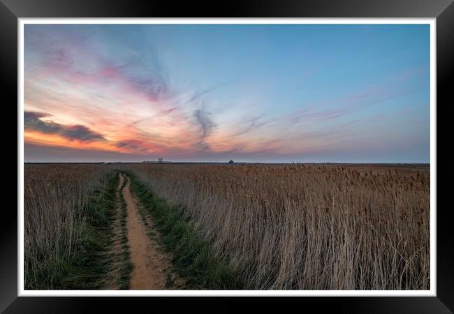 Lingering colours of sunset at Thornham Framed Print by Gary Pearson