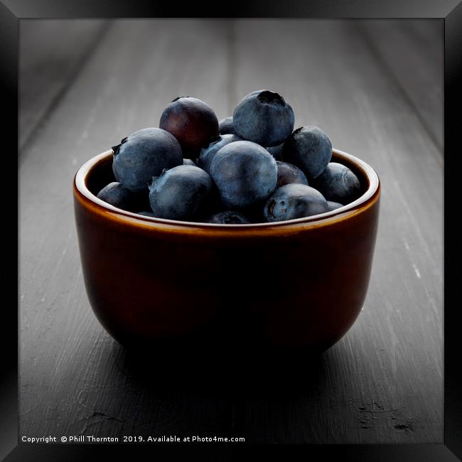 Still life of blueberries in a bowl Framed Print by Phill Thornton