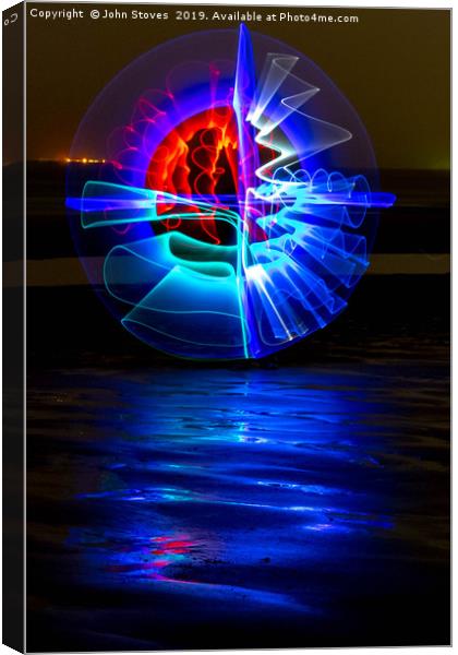 Lightpainting on a beach Canvas Print by John Stoves