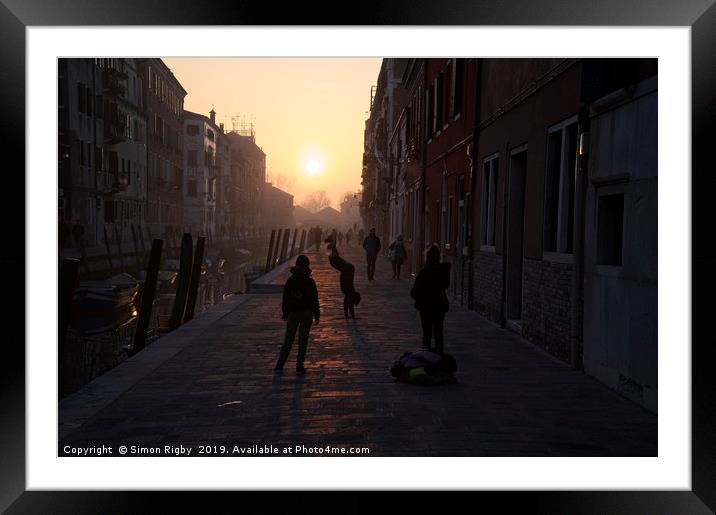 Cartwheeling into the sunset Framed Mounted Print by Simon Rigby