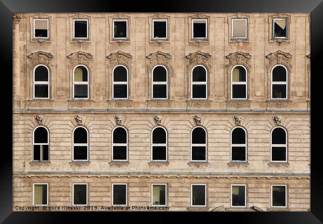 old building wall with windows Framed Print by goce risteski