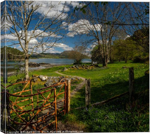 Through a kissing gate to a holiday home by a Loch Canvas Print by Richard Smith
