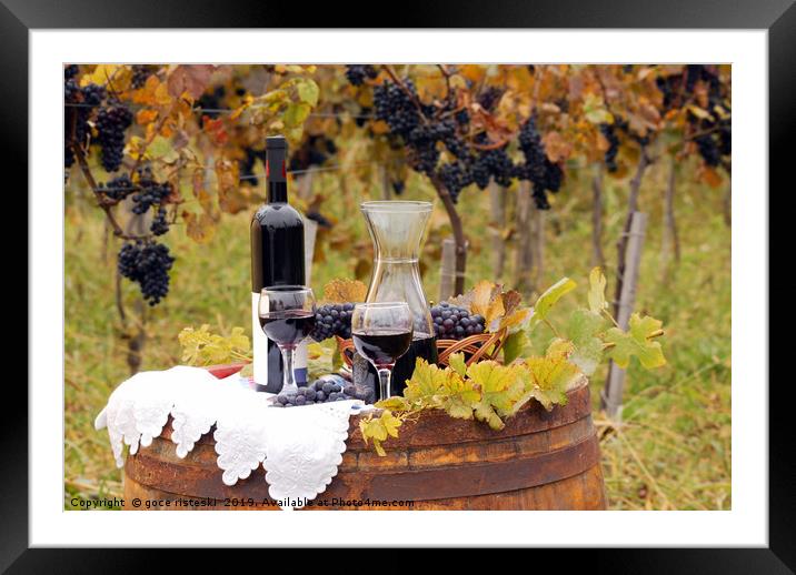 red wine and grape on wooden barrel Framed Mounted Print by goce risteski