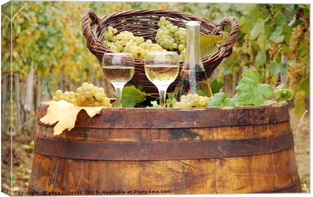 white wine and grape on wooden barrel Canvas Print by goce risteski