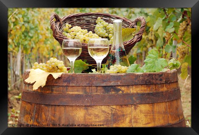 white wine and grape on wooden barrel Framed Print by goce risteski
