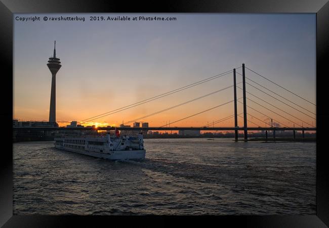 Vessel Moving Along The Rhine Embankment  At Sunse Framed Print by rawshutterbug 