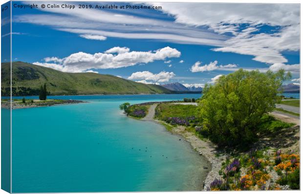 Lake Tekapo and long white clouds  Canvas Print by Colin Chipp