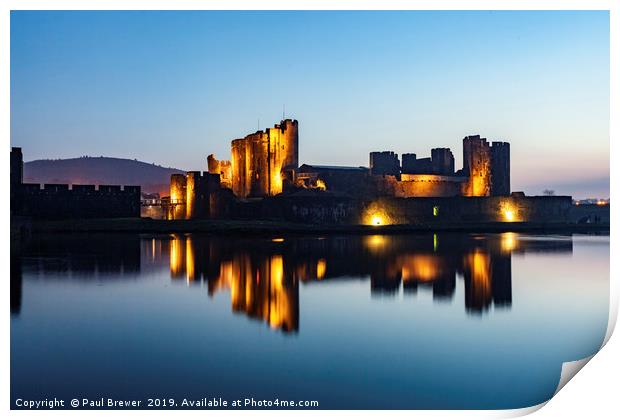 Caerphilly Castle at night in winter Print by Paul Brewer