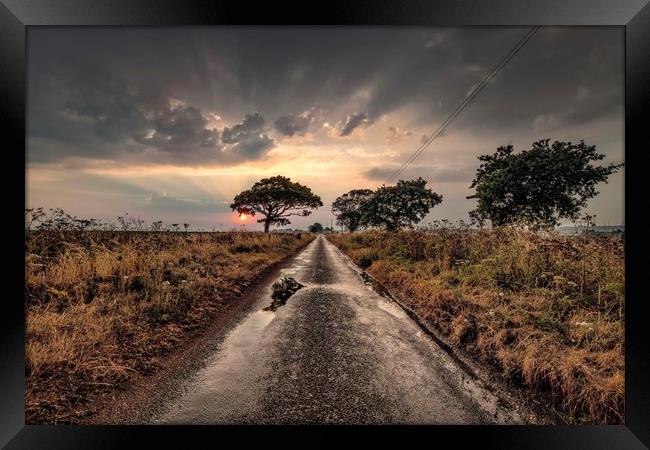 Sunrise and showers on the road to Thornham Framed Print by Gary Pearson