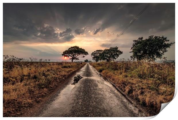 Sunrise and showers on the road to Thornham Print by Gary Pearson