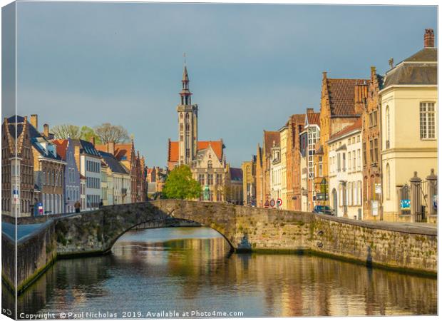 Spring morning in Bruges Canvas Print by Paul Nicholas