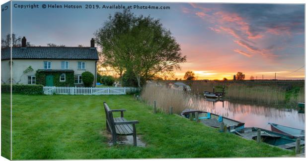 Stunning sunset over moorings at West Somerton Canvas Print by Helen Hotson