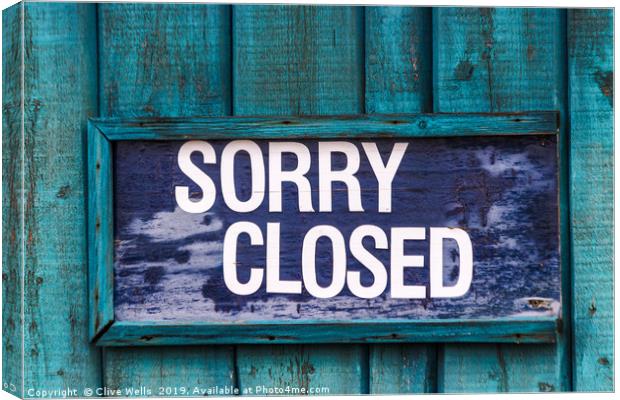 Sorry closed sign in blue Canvas Print by Clive Wells