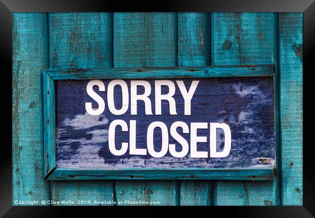 Sorry closed sign in blue Framed Print by Clive Wells