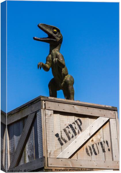 Dino on a KEEP OUT box Canvas Print by Clive Wells