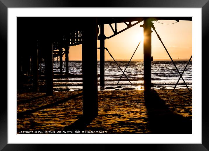 Sunset underneath Weston Super Mare Pier Framed Mounted Print by Paul Brewer