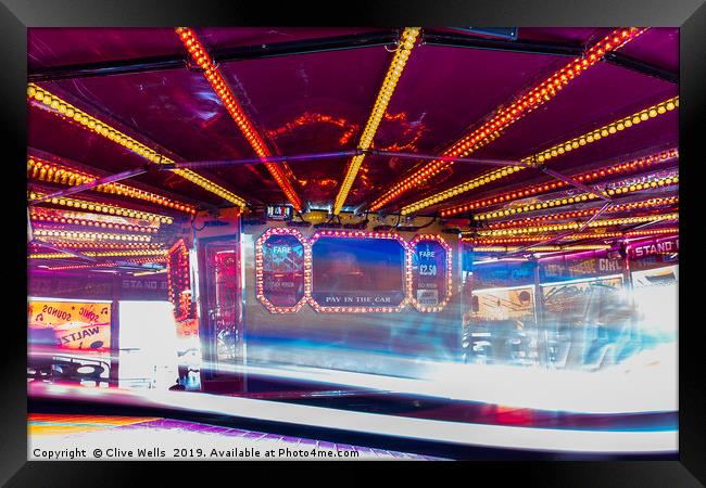 The Waltzer fairgrown ride at Kings Lynn, Norfolk Framed Print by Clive Wells