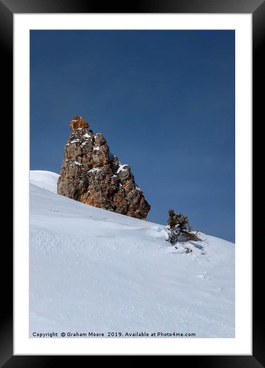 Snow and Rock Framed Mounted Print by Graham Moore