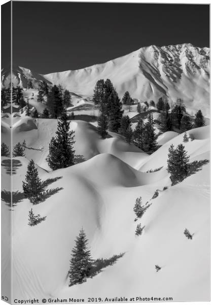 Undulating snowy mountainscape monochrome Canvas Print by Graham Moore