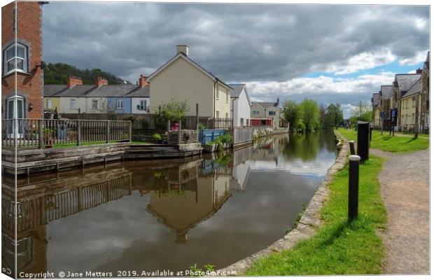 Living Alonside the Canal Canvas Print by Jane Metters