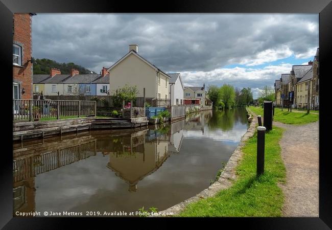 Living Alonside the Canal Framed Print by Jane Metters