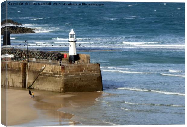 St Ives Lighthouse. Canvas Print by Lilian Marshall