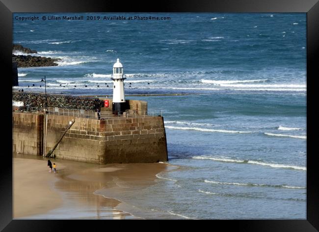 St Ives Lighthouse. Framed Print by Lilian Marshall