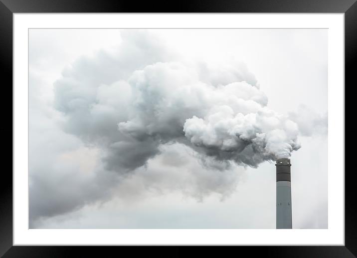 Tall chimney exhausting pollution in the air Framed Mounted Print by Ankor Light