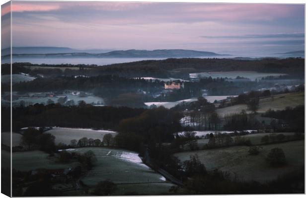 Eastnor Castle, on a cold winters morning Canvas Print by David Wall