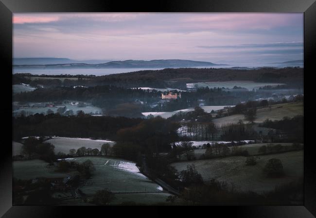 Eastnor Castle, on a cold winters morning Framed Print by David Wall