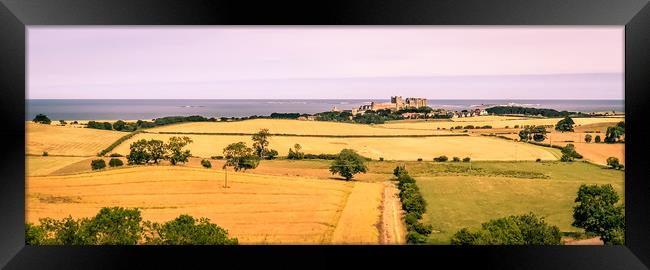 A panoramic vista of Bamburgh Castle Framed Print by Naylor's Photography