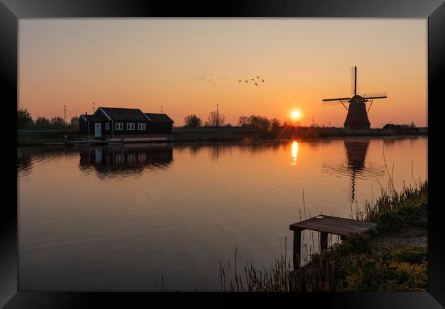 Loading platform at the edge with the calm water Framed Print by Ankor Light