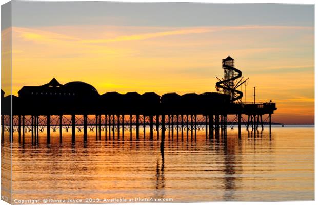 Herne Bay pier at sunset Canvas Print by Donna Joyce