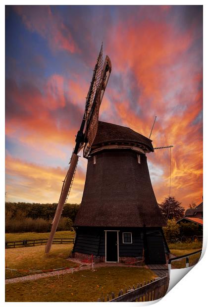 Vivid red and orange color sunset over a Dutch win Print by Ankor Light