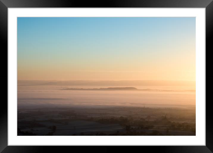 Mist covering the English countryside on a cold wi Framed Mounted Print by David Wall