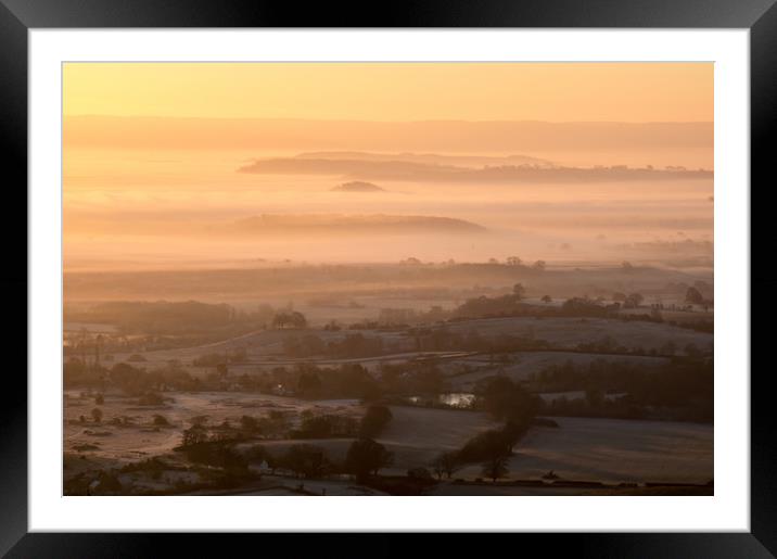 Winter sunrise over the countryside. Framed Mounted Print by David Wall