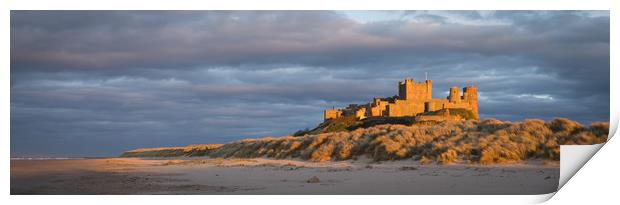 Bamburgh Castle as the Sun goes down Print by Naylor's Photography