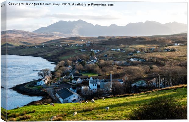 Looking over Carbost to the distant Cuillin Hills Canvas Print by Angus McComiskey