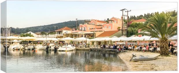 Fiscardo waterfront facing Elli's restaurant Canvas Print by Naylor's Photography
