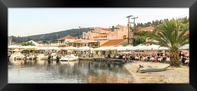 Fiscardo waterfront facing Elli's restaurant Framed Print by Naylor's Photography