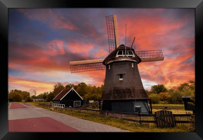 Sunset over a Dutch windmill  Framed Print by Ankor Light