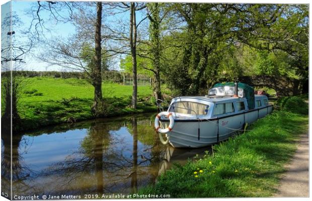 Cruising on the Canal Canvas Print by Jane Metters